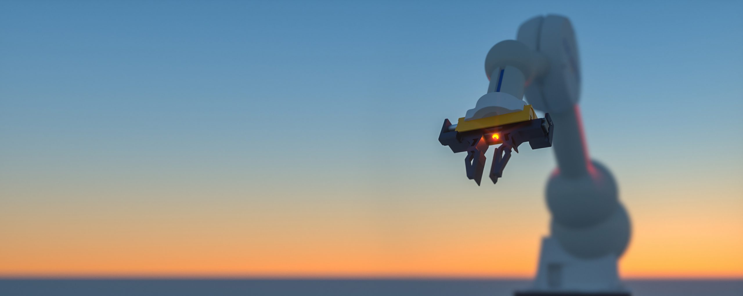 Image of robotic arm with the sunset in the background.