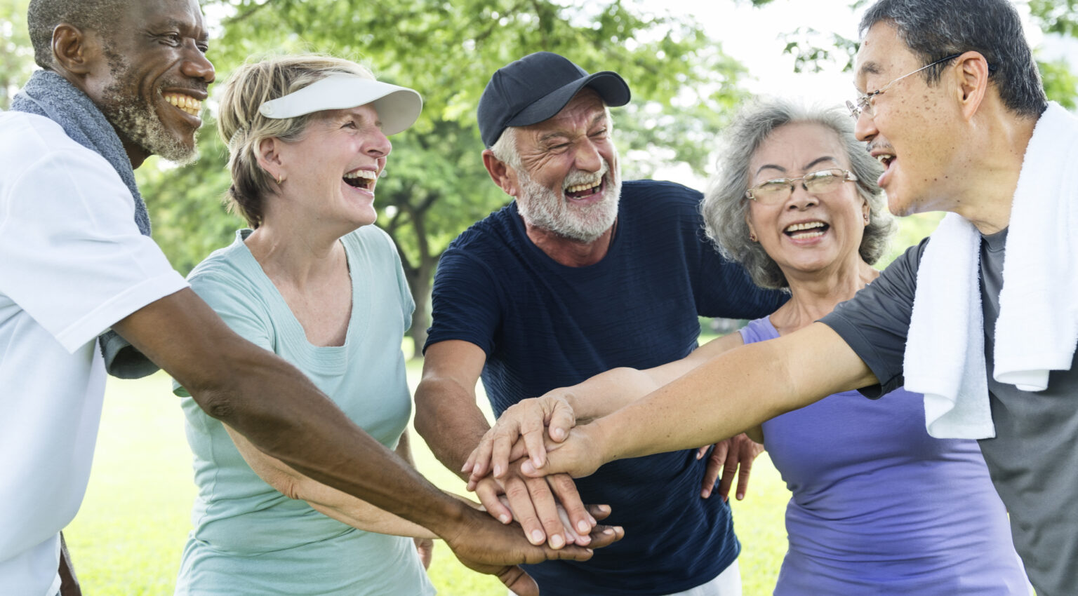 Elderly people exercising outdoors